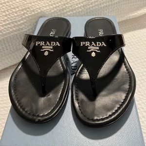 Authentic woman’s Prada Sandals with silver hardware